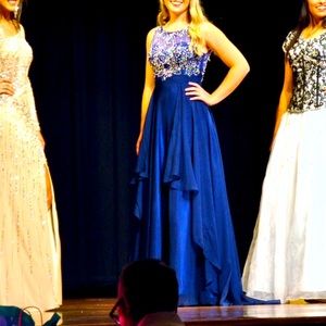 Blue pageant dress with short train. Bodice with beading.